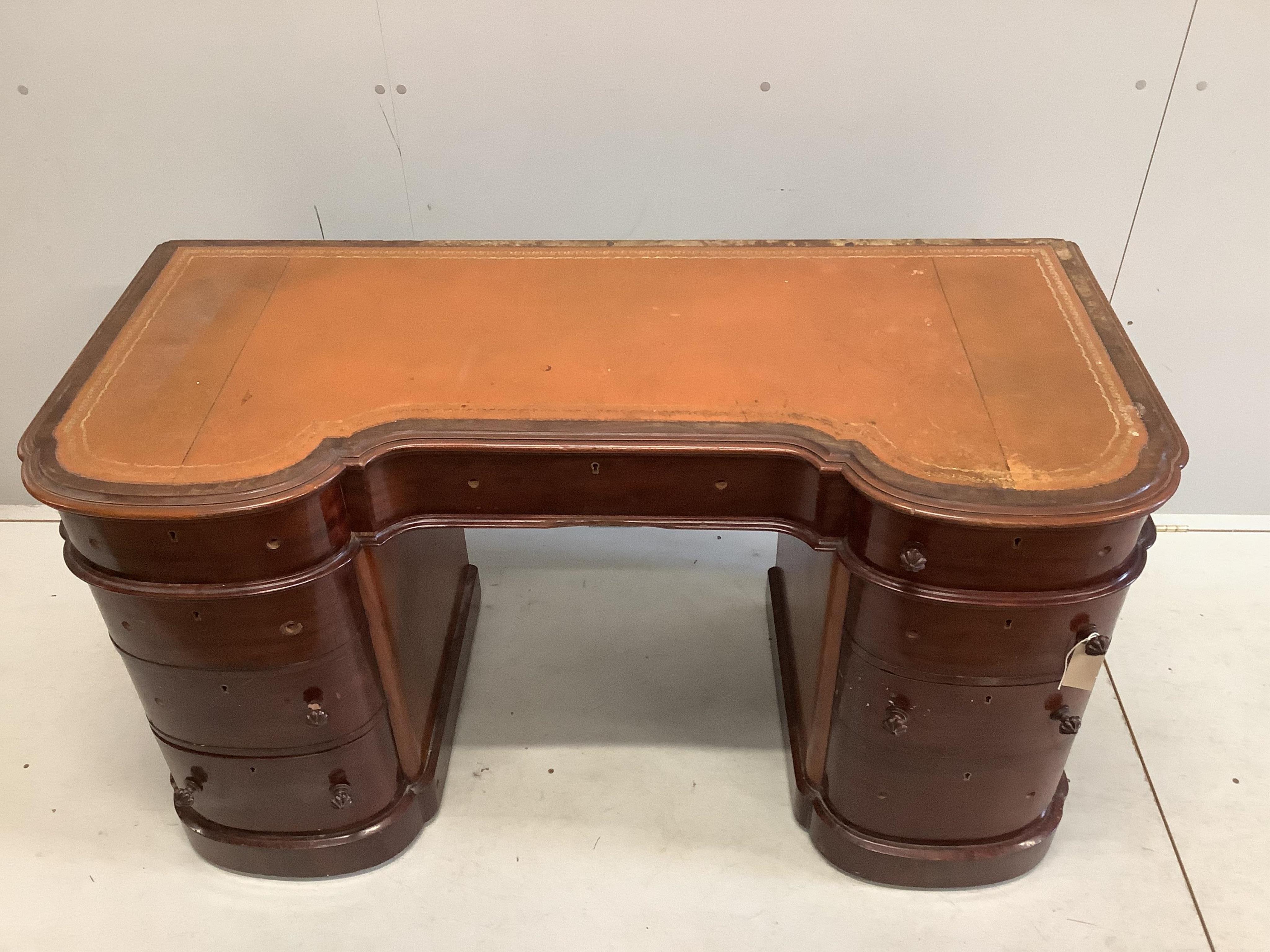 A Victorian mahogany bow front pedestal desk, width 138cm, depth 62cm, height 76cm. Condition - poor